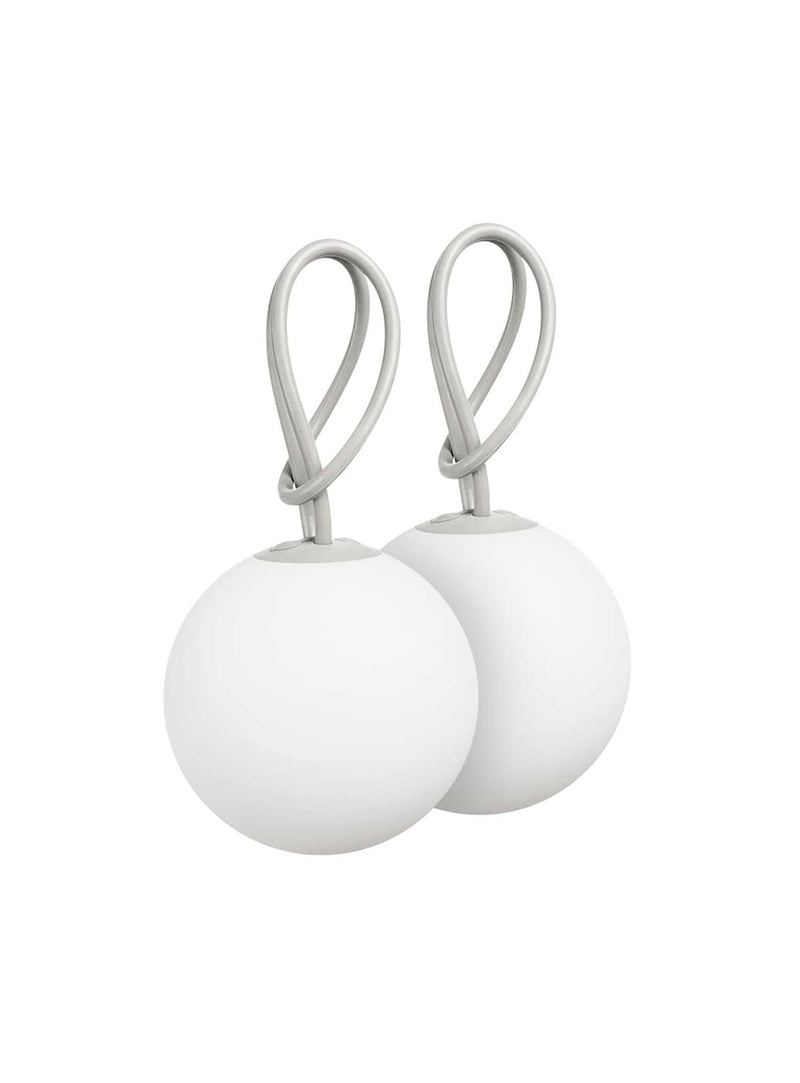 Ensemble de 2 lampes Bolleke de Fatboy en gris clair, design LED rechargeable et portable, parfait pour éclairer vos espaces intérieurs et extérieurs au Canada."
