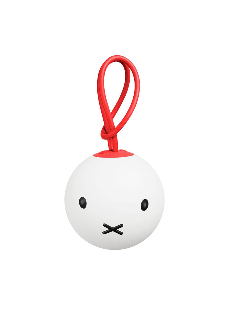 Lampe Bolleke x Miffy de Fatboy avec le visage emblématique de Miffy, lampe DEL portable à lumière chaude.