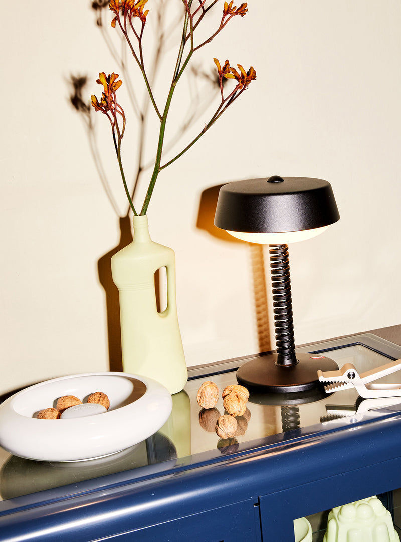 Lampe Bellboy Fatboy : rechargeable et portable, avec intensité réglable, parfaite pour créer une ambiance chaleureuse au Canada.