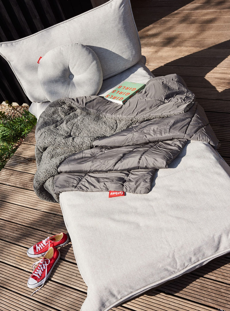 Coussin extérieur Fatboy Circle Pillow : durable, antitaches, et disponible en motifs vibrants. Conçu pour balcons et patios au Canada.