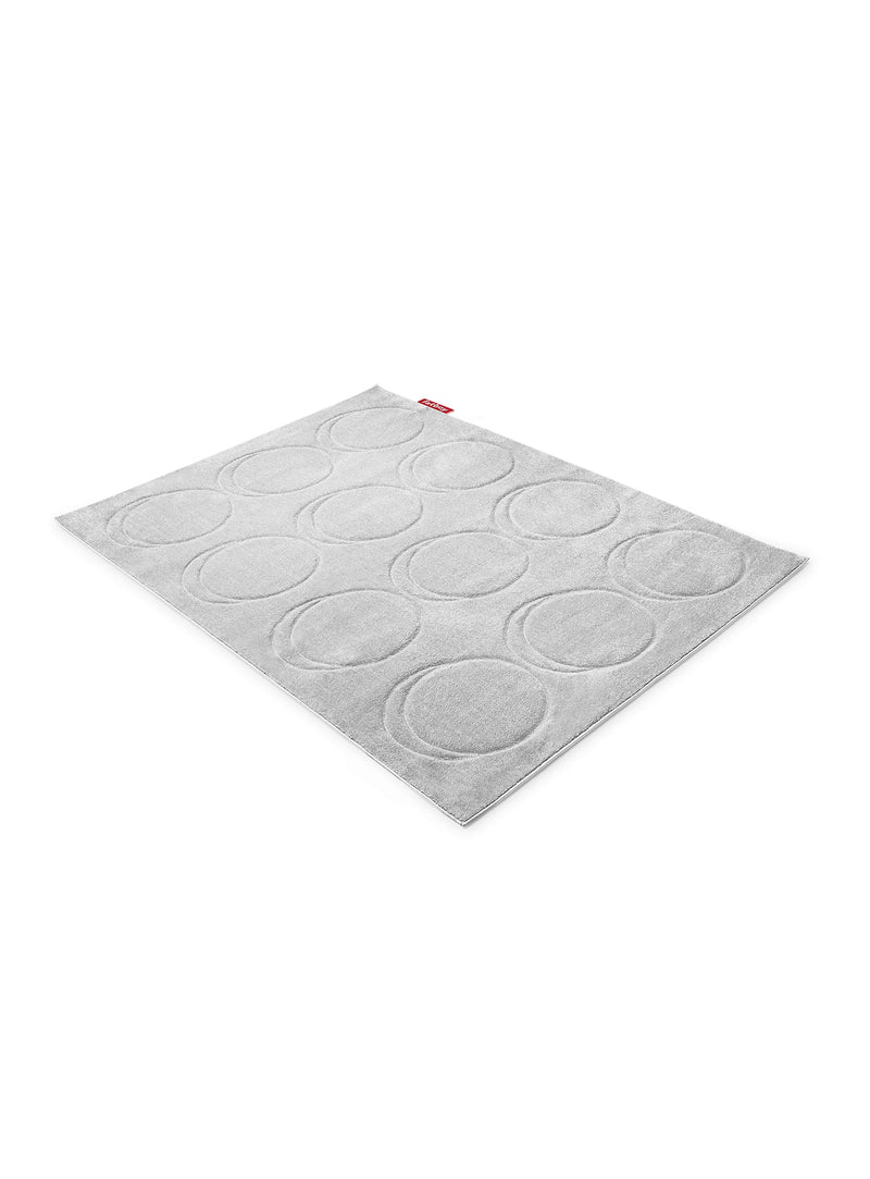 Fatboy Dot Carpet : tapis décoratif de luxe, parfait pour un salon ou une chambre, avec texture cisaillée et palette neutre.