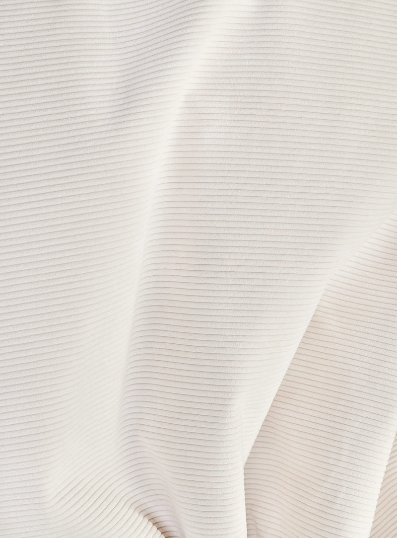 Tissu Cord recyclé blanc crème de Fatboy : doux, côtelé et durable, fabriqué en polyester recyclé, idéal pour un usage intensif en intérieur.