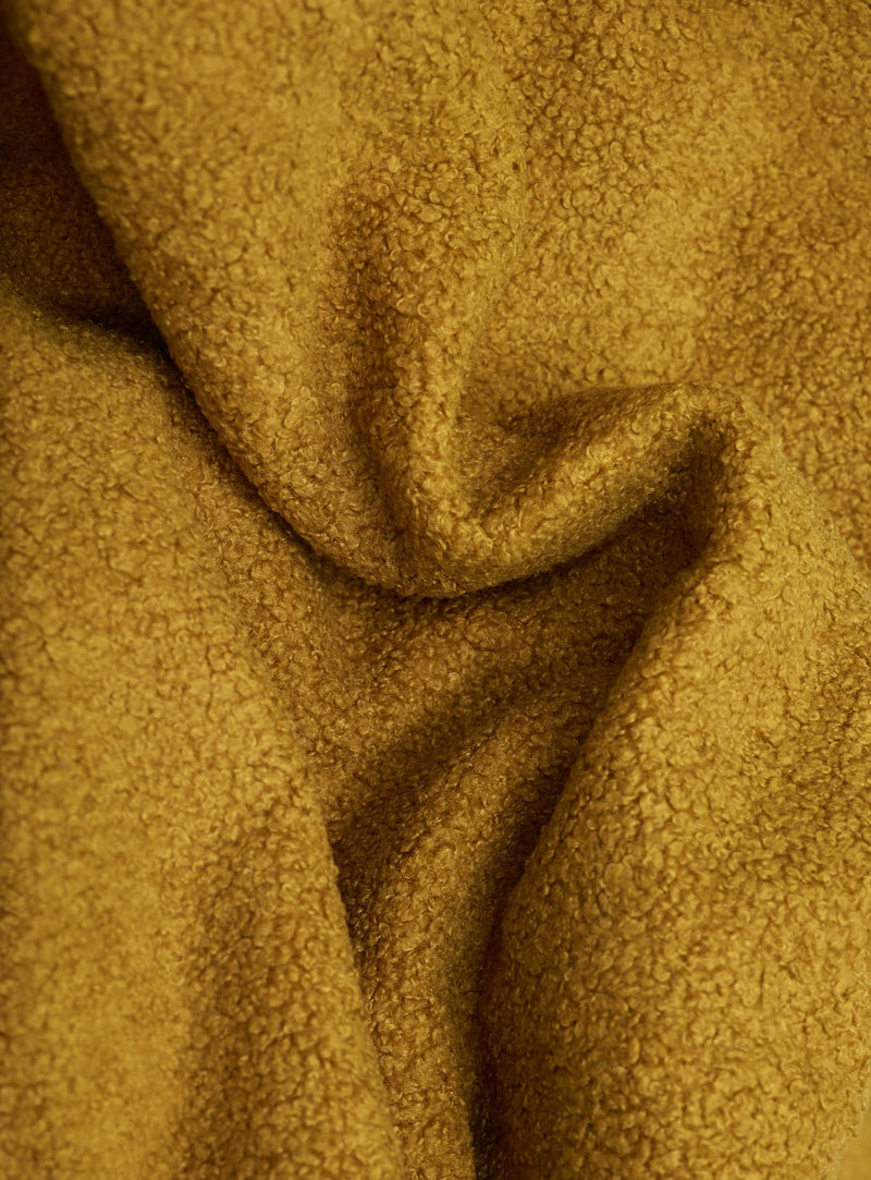 Tissu sherpa cidre de Fatboy : doux et résistant, aspect shearling, lavable en machine, idéal pour usage intensif en intérieur.