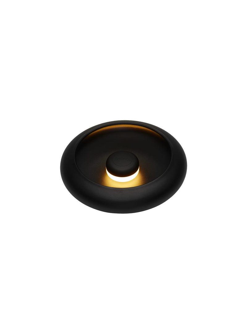 Lampe Oloha petite anthracite de Fatboy : lampe LED magnétique rechargeable, polyvalente pour table ou mur, parfaite pour décor canadien.