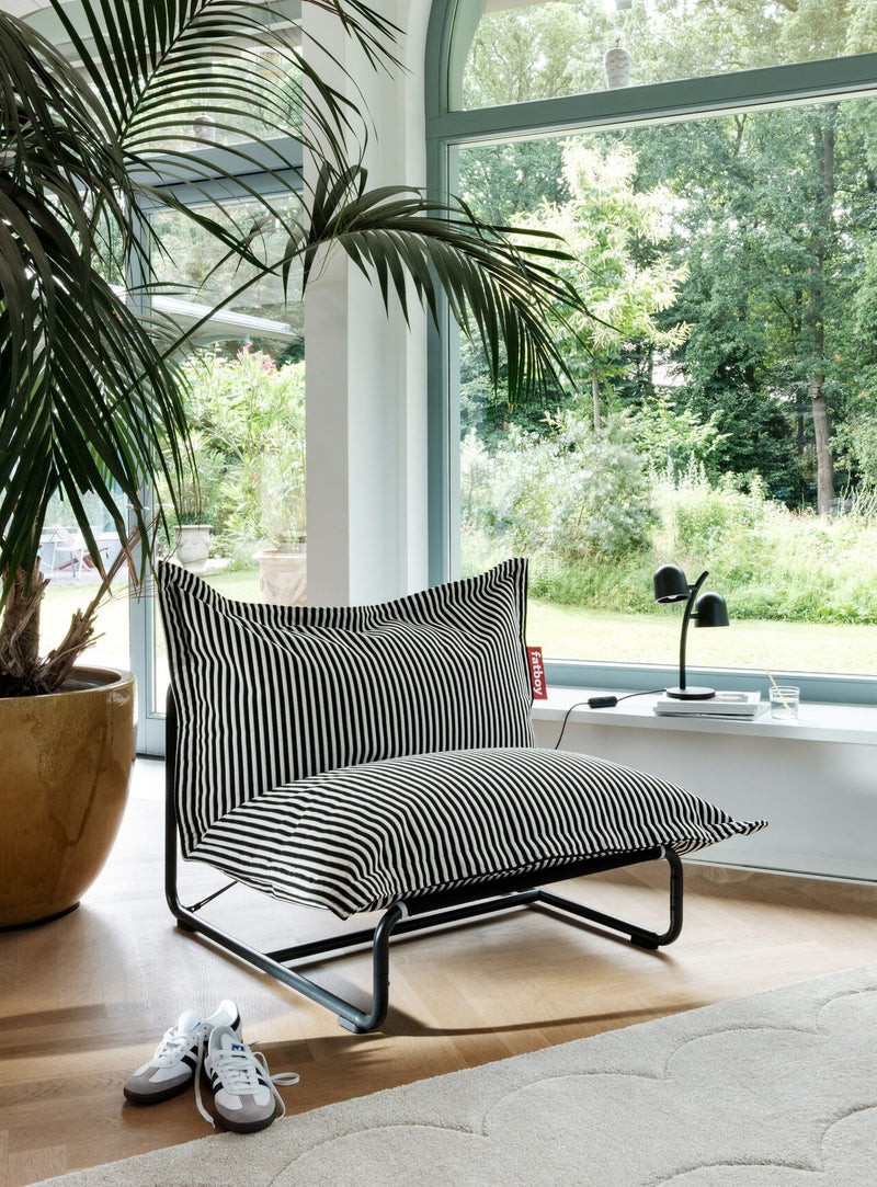 Transformez votre pouf Fatboy en fauteuil lounge structuré avec le Beanbase : plus de soutien, assemblage facile et confort iconique.