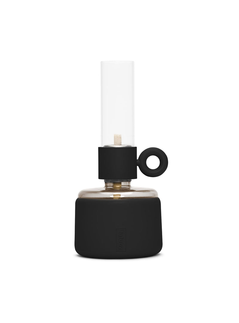 Lampe à huile Flamtastique XS noir de Fatboy : design moderne en verre borosilicate et silicone, idéale pour créer une ambiance chaleureuse au Canada.