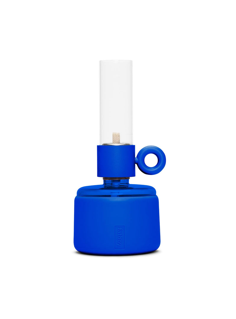 Lampe à huile Flamtastique XS bleu de Fatboy : design moderne en verre borosilicate et silicone, idéale pour créer une ambiance chaleureuse au Canada.