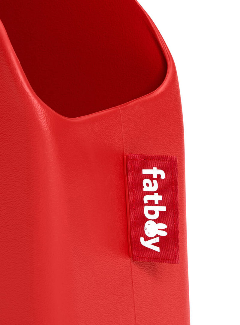 Matière EVA légère qui garde sa forme, avec une finition rouge éclatante et le visage graphique de Miffy.