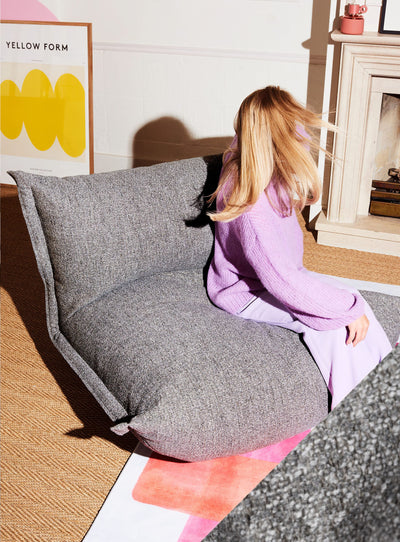 Le Fatboy The BonBaron Mingle est un fauteuil en tissu bouclé alliant confort moelleux, design élégant et solidité, idéal pour les intérieurs canadiens.